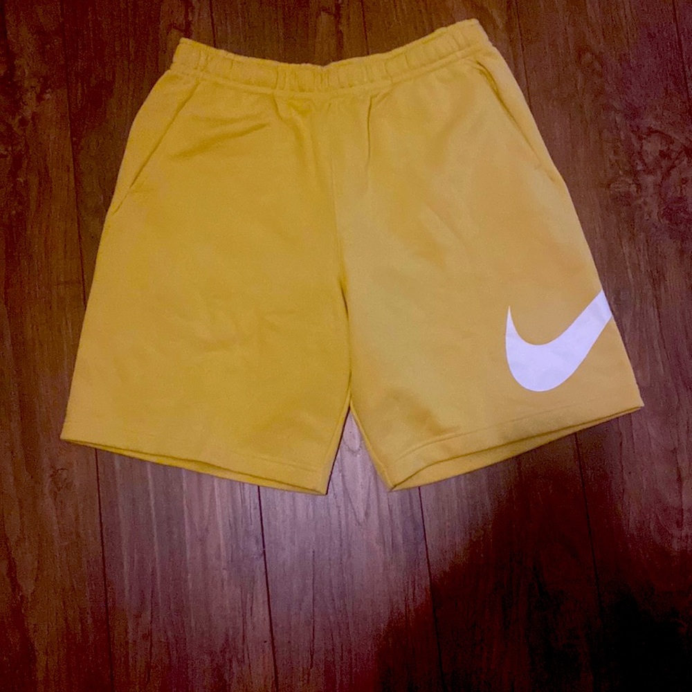 Brand new yellow Nike shorts. L
